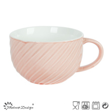 Vidro cor-de-rosa da cor com caneca da sopa de